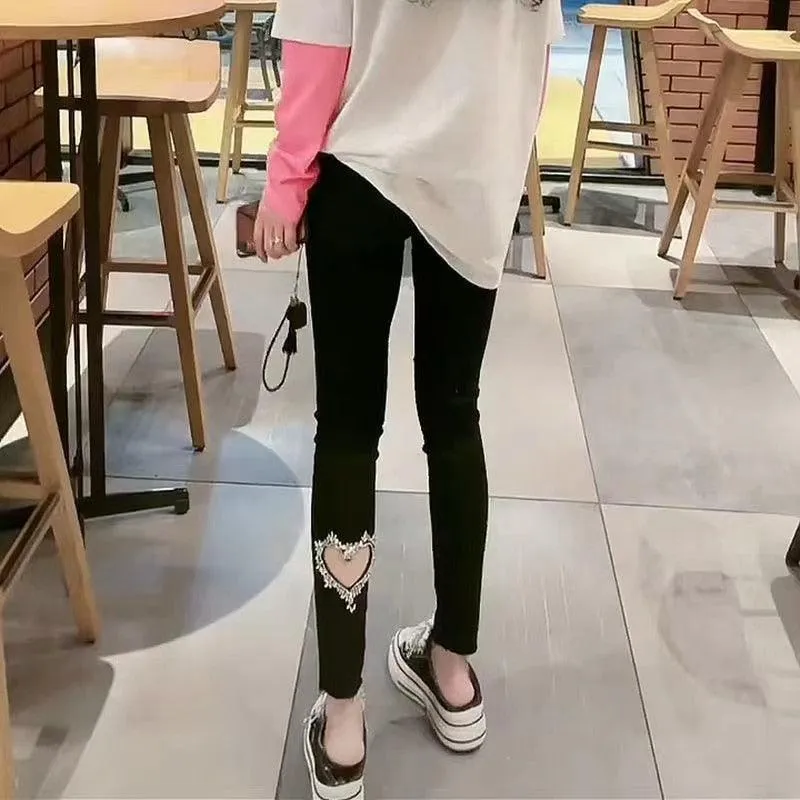 Casual Stretch Pants with Elastic High Waist and Metal Buttons