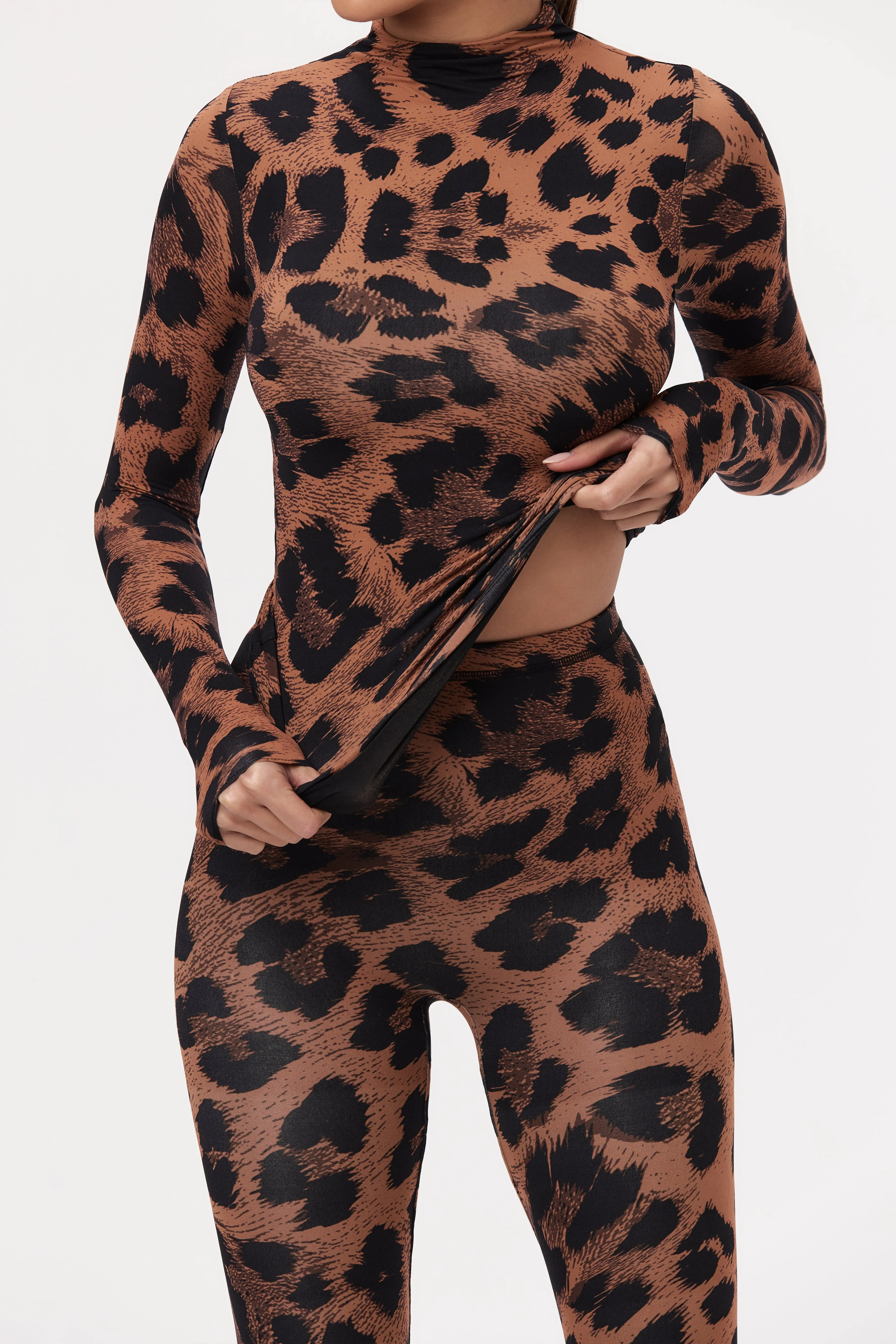 Naked Print Turtleneck Top