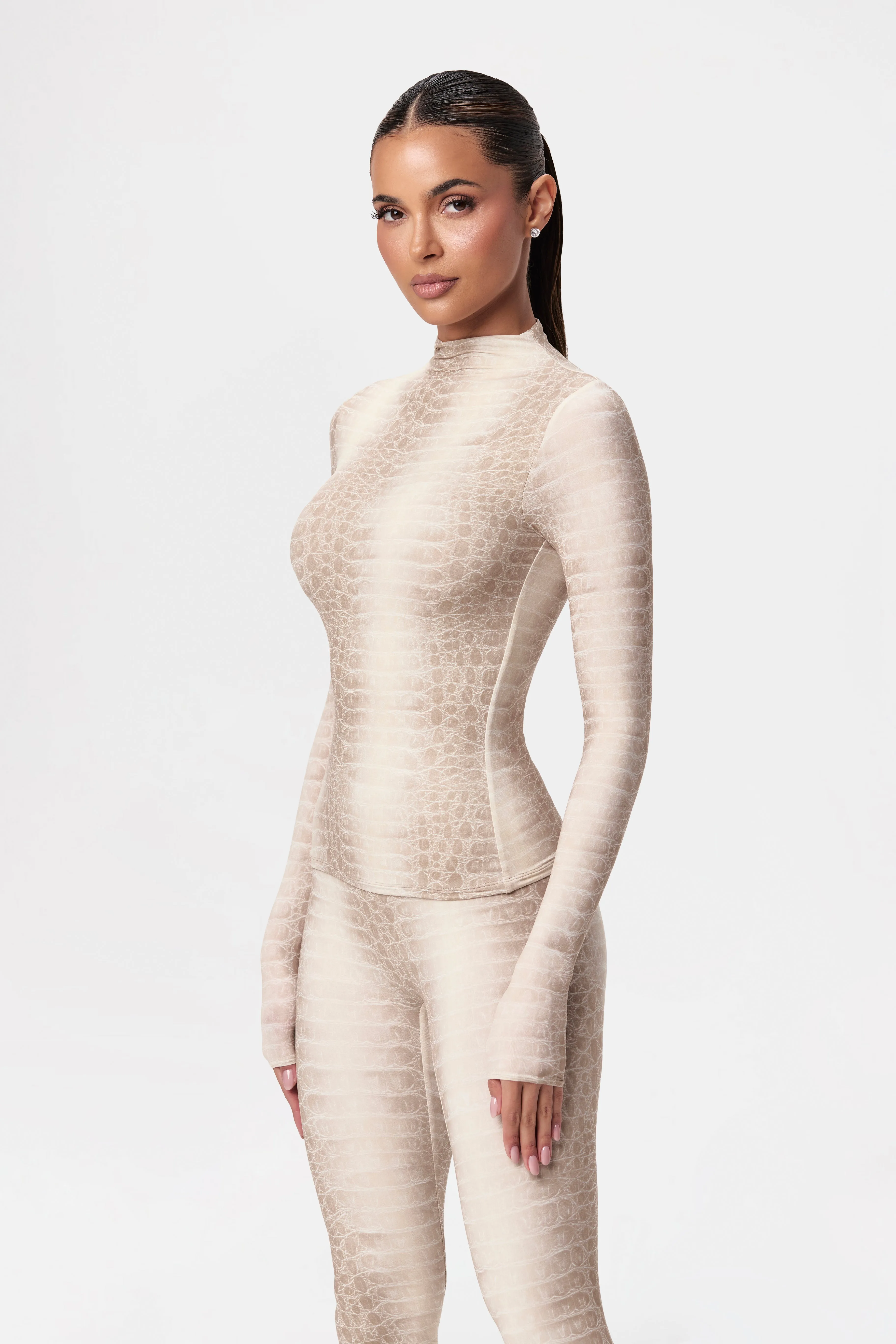 Naked Print Turtleneck Top