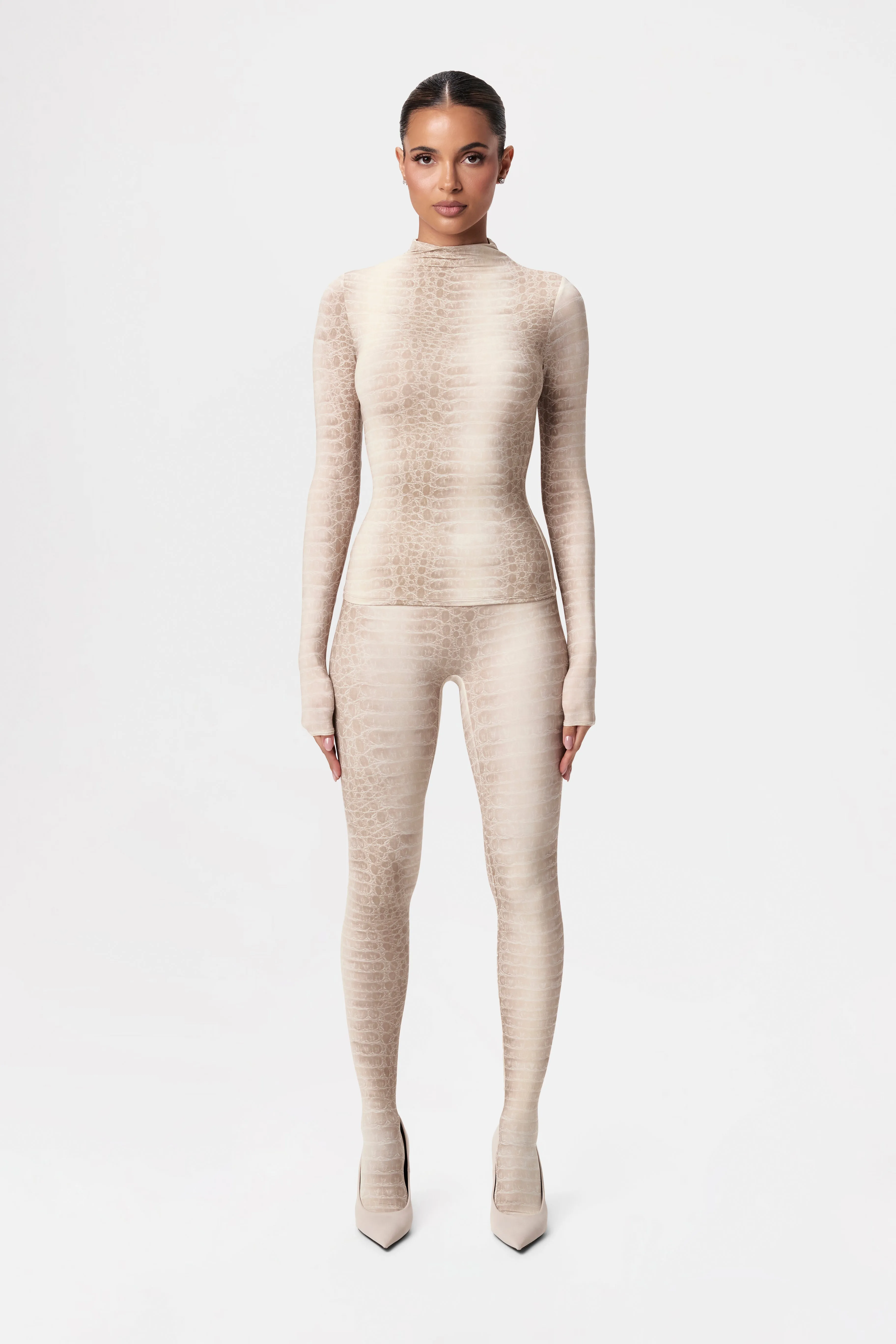 Naked Print Turtleneck Top