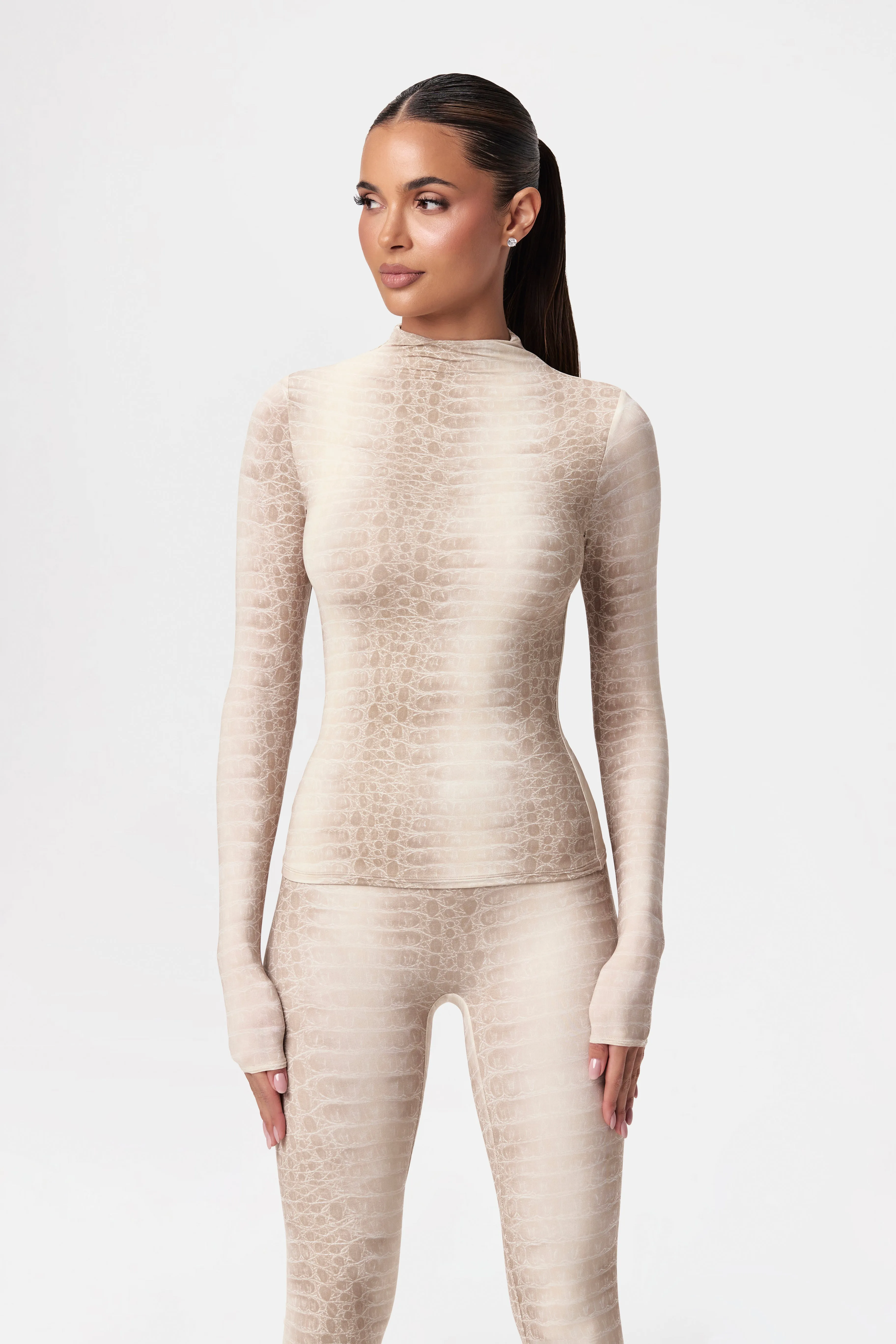 Naked Print Turtleneck Top