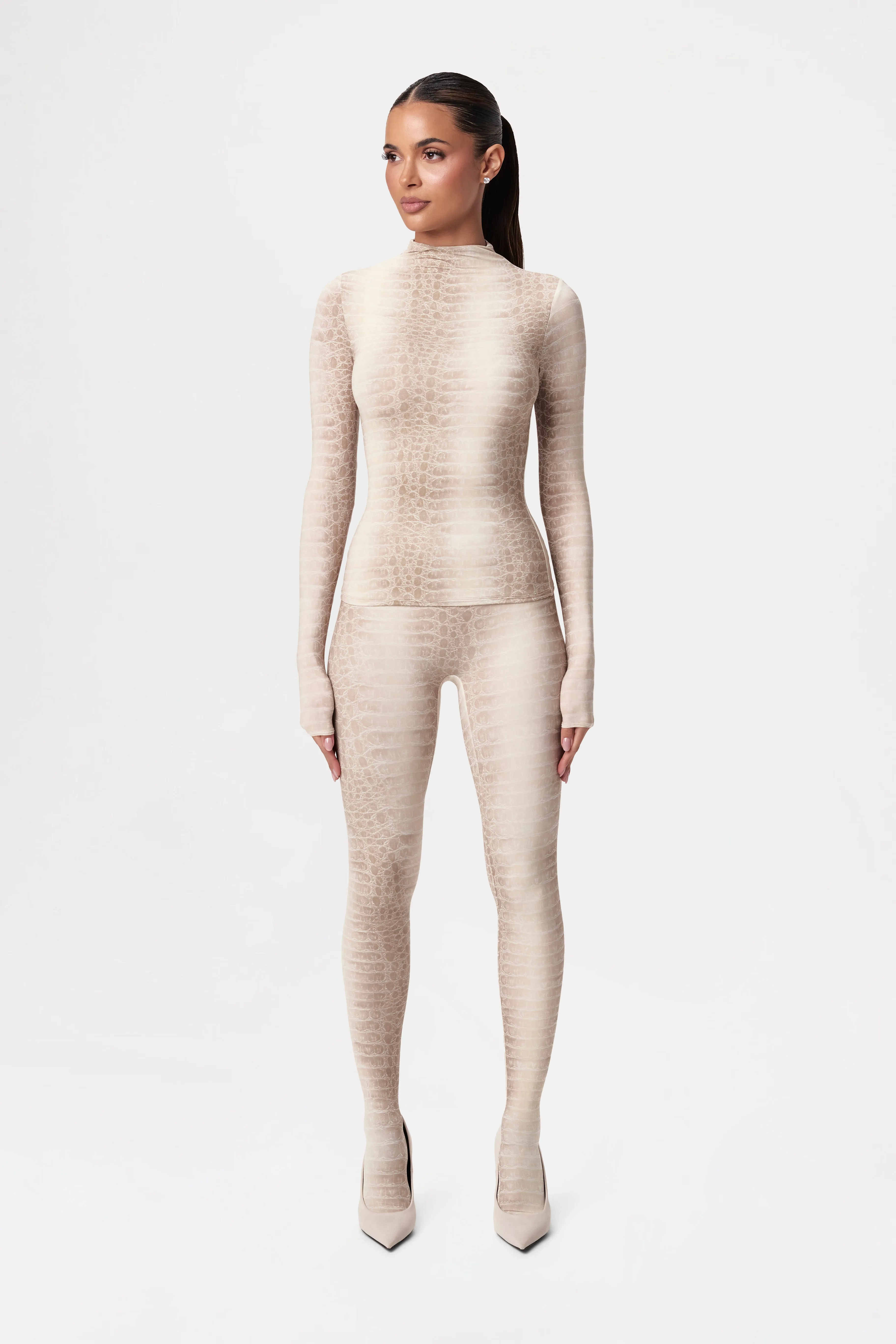 Naked Print Turtleneck Top
