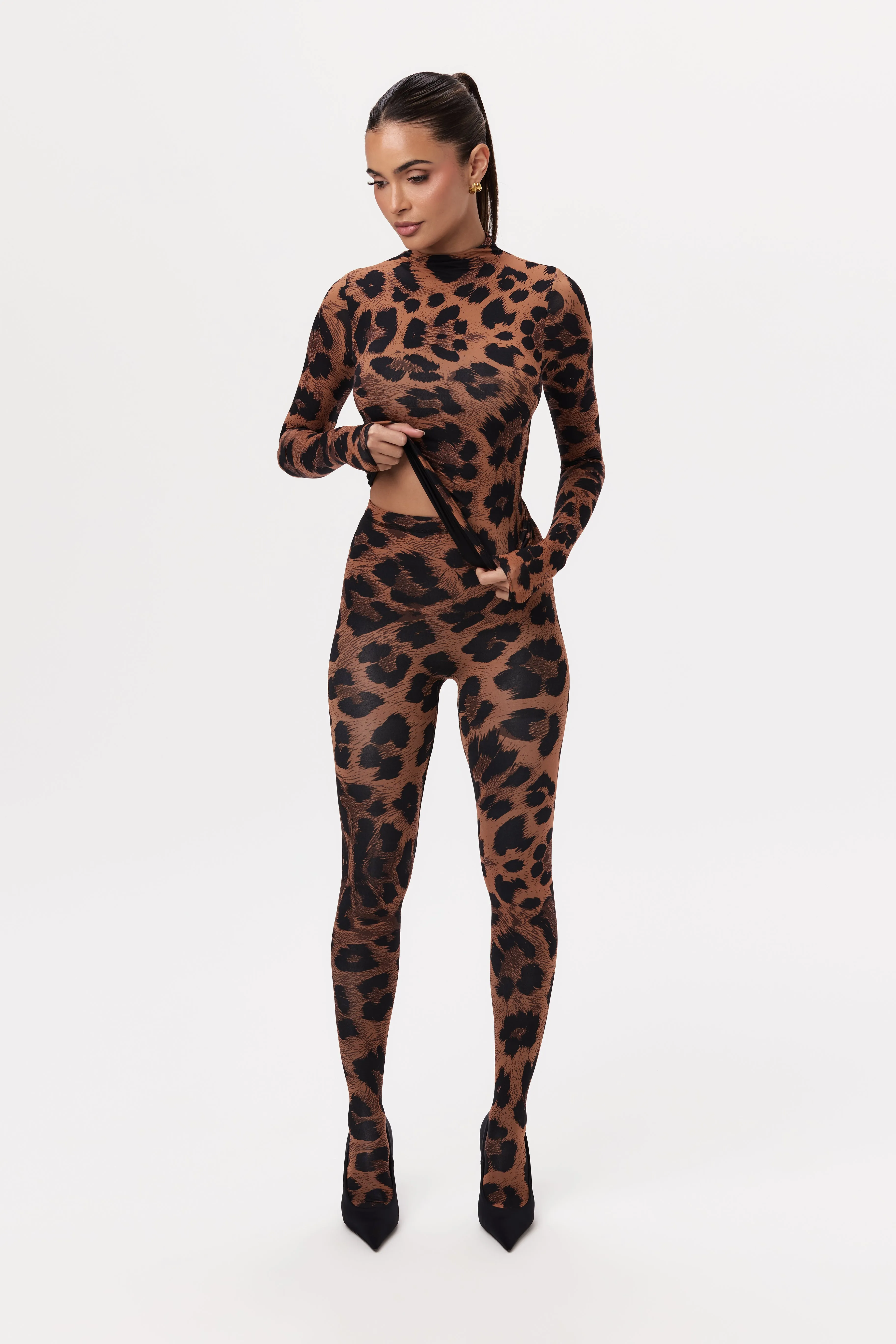 Naked Print Turtleneck Top