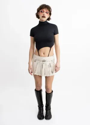 Pleated distressed faux leather mini skirt