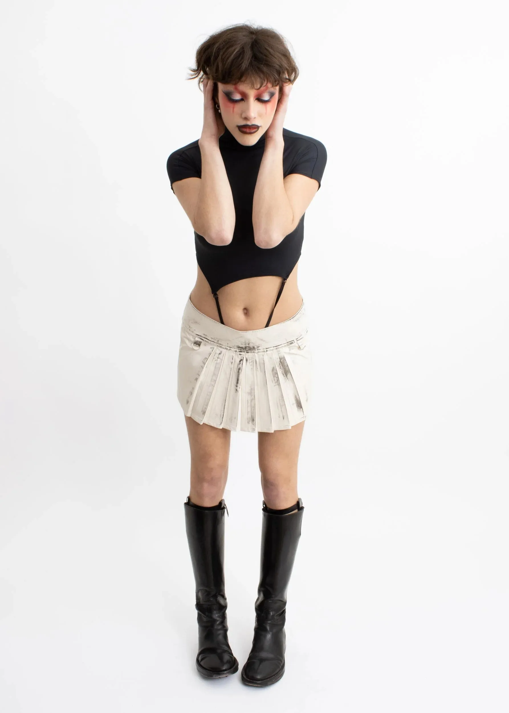 Pleated distressed faux leather mini skirt