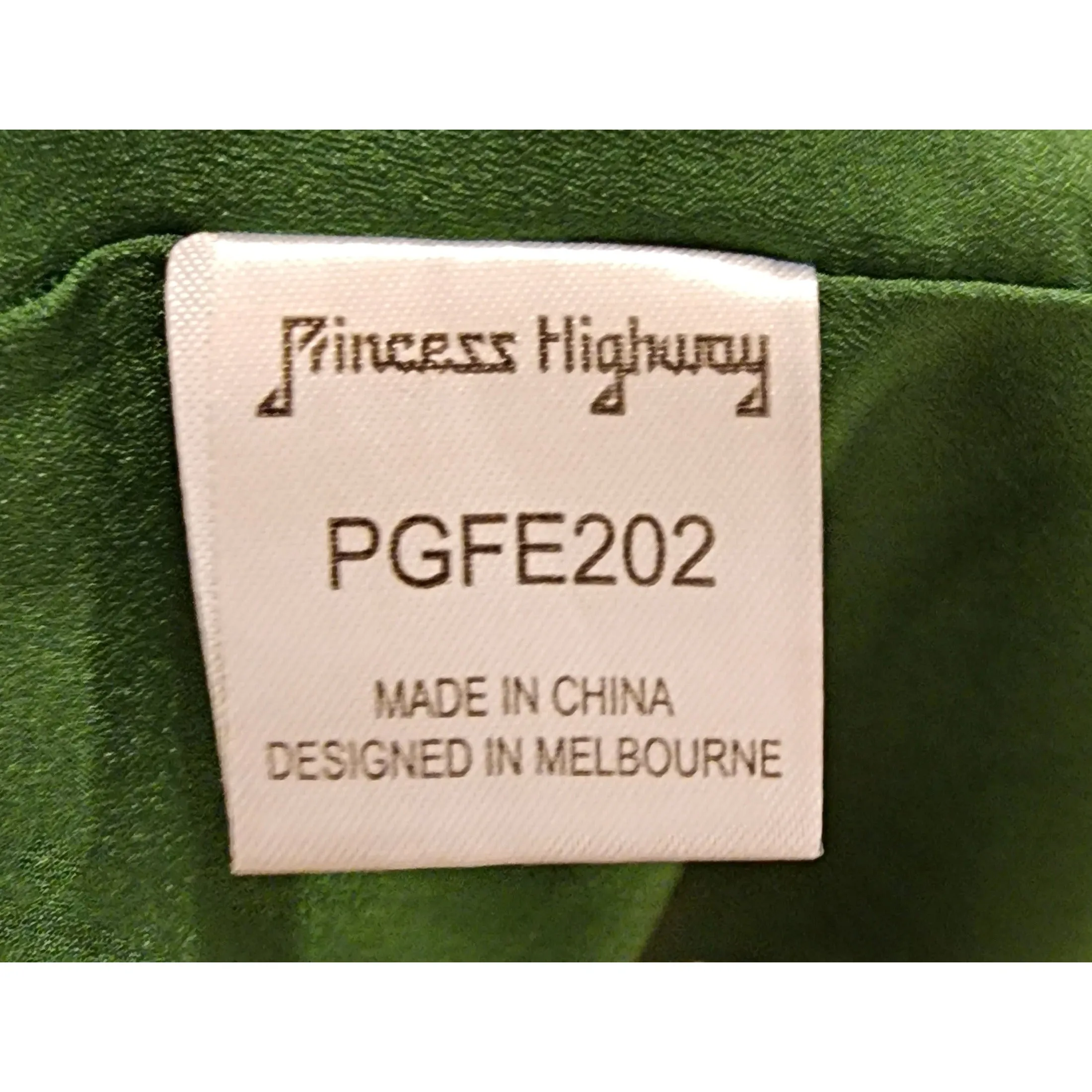 Princess Highway green skirt with blue polka dots size 6